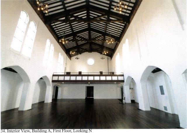After: Interior view of the sanctuary facing the front entrance with balcony above.